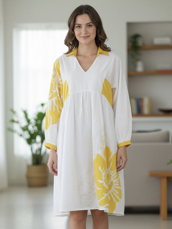 Stylish Yellow Cotton Cambric Printed Mini Dress