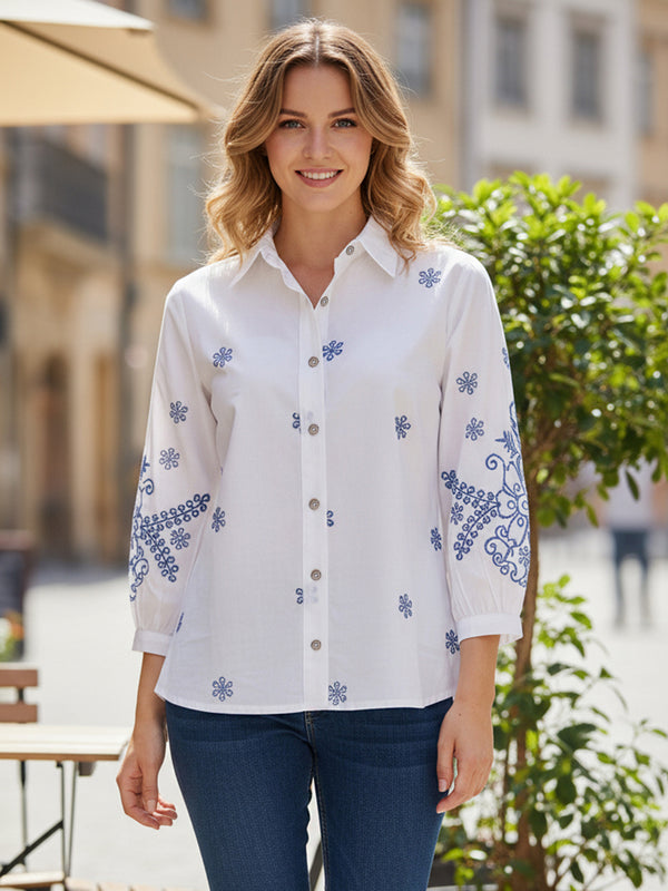 Elegant White Button-Down Shirt with Blue Floral Detailing
