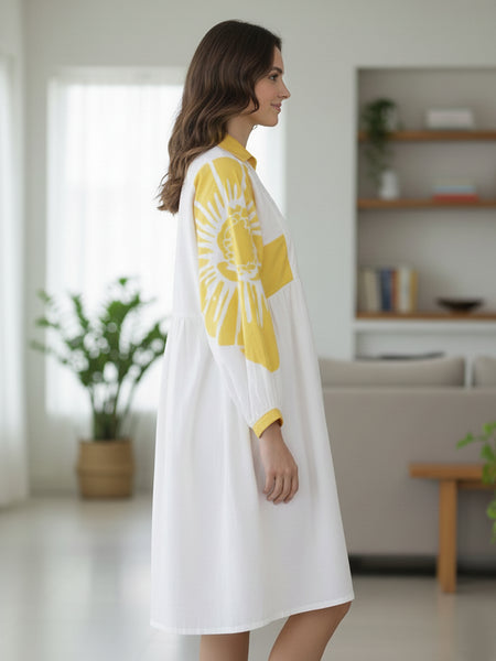 Stylish Yellow Cotton Cambric Printed Mini Dress