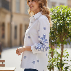 Elegant White Button-Down Shirt with Blue Floral Detailing