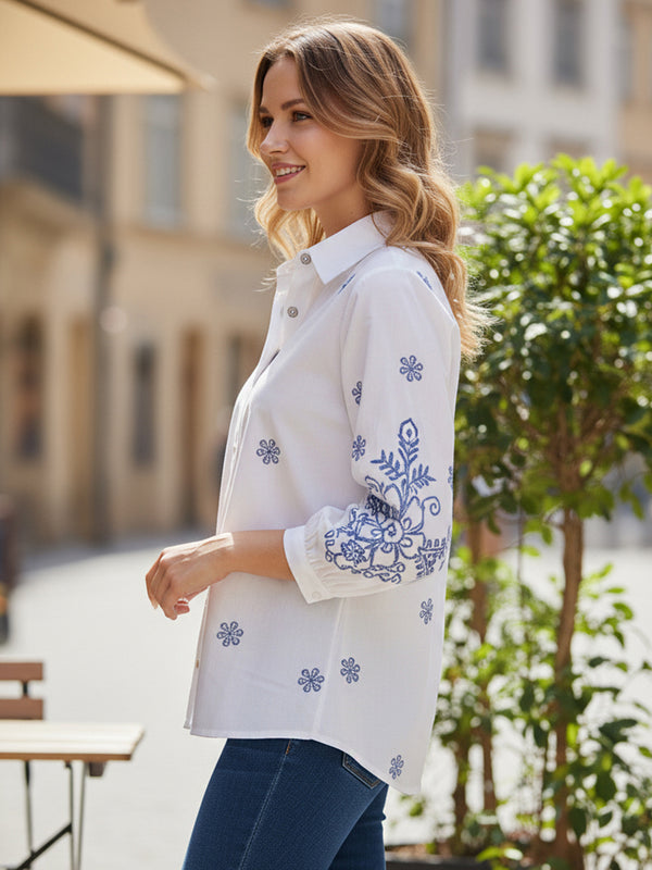 Elegant White Button-Down Shirt with Blue Floral Detailing