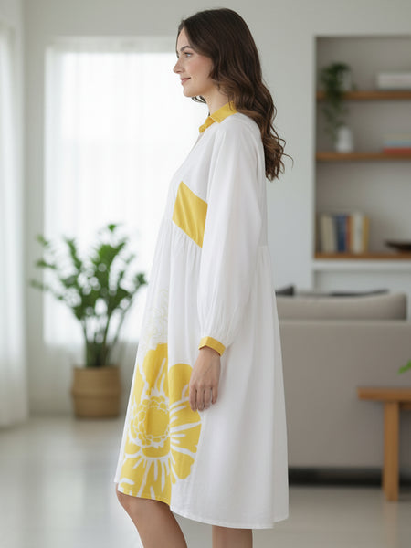 Stylish Yellow Cotton Cambric Printed Mini Dress