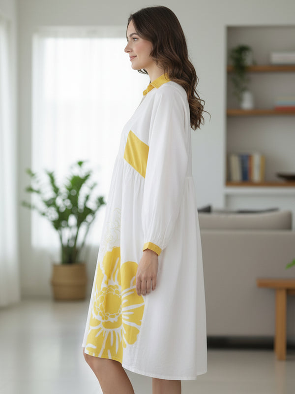 Stylish Yellow Cotton Cambric Printed Mini Dress