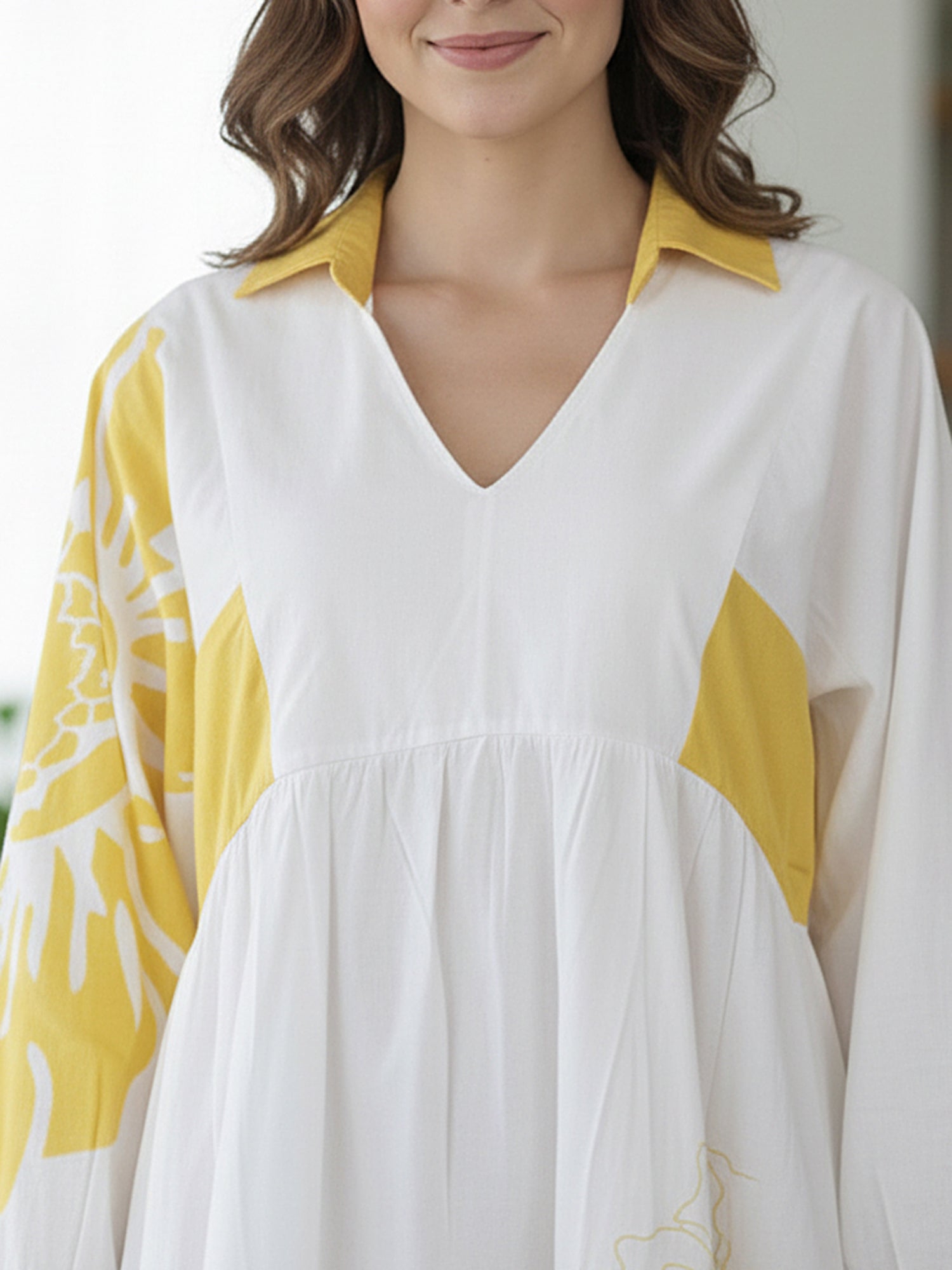 Stylish Yellow Cotton Cambric Printed Mini Dress