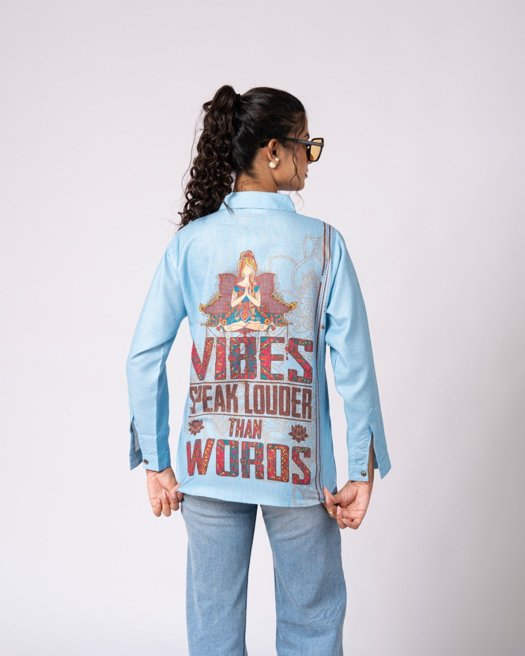 Artistic Blue Shirt Featuring Meditation Inspired Artwork