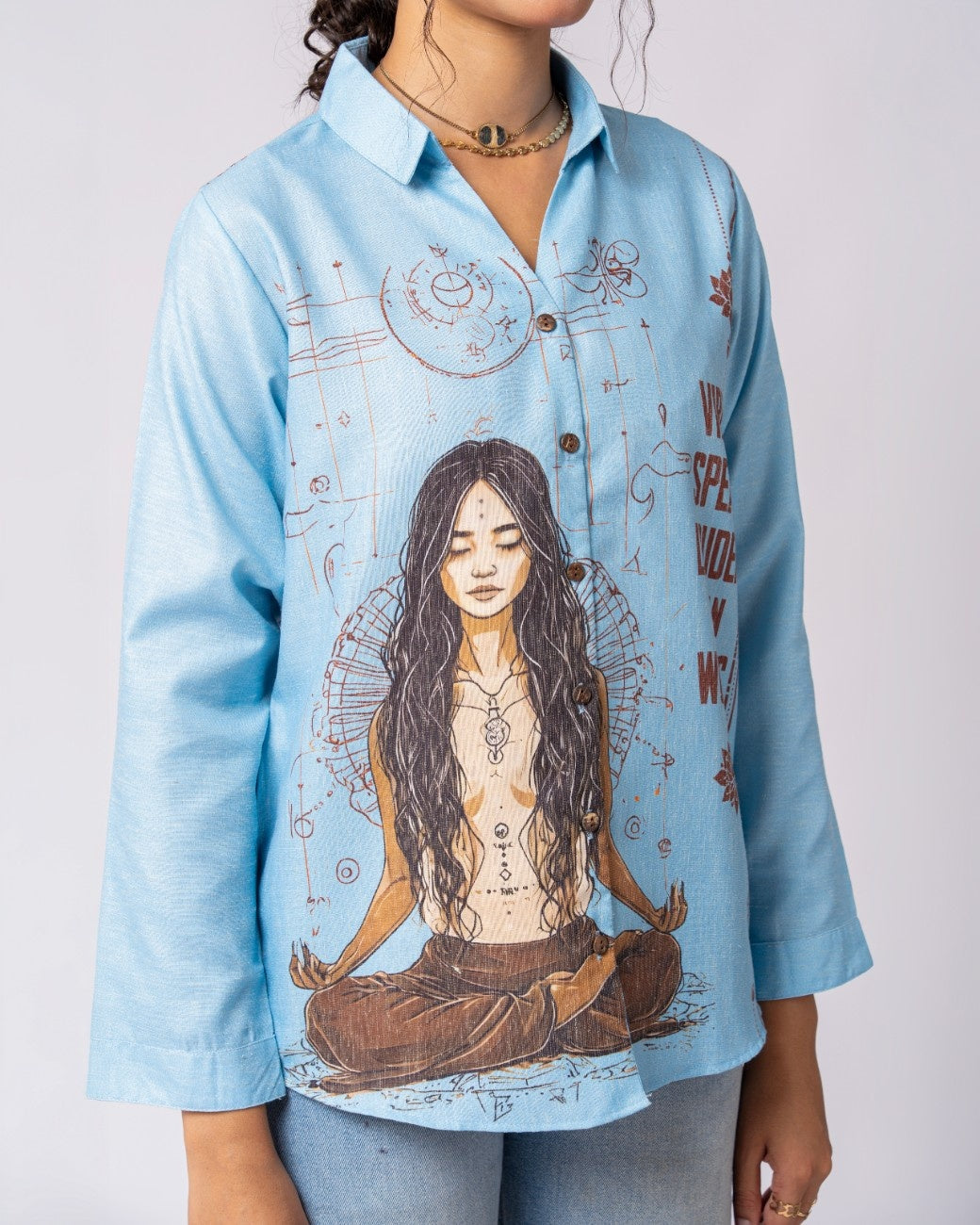 Artistic Blue Shirt Featuring Meditation Inspired Artwork