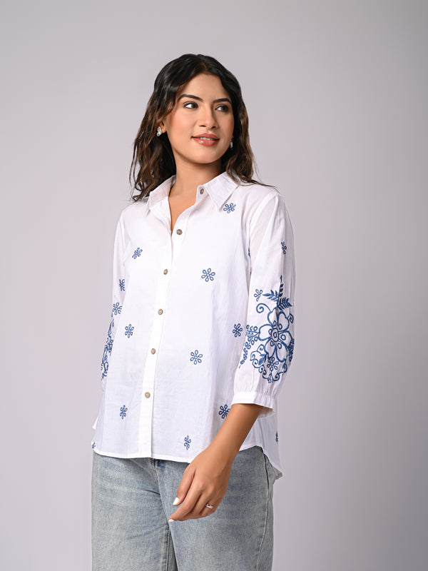 Elegant White Button-Down Shirt with Blue Floral Detailing