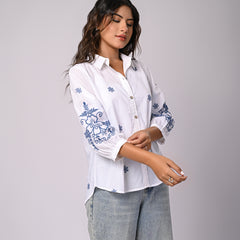 Elegant White Button-Down Shirt with Blue Floral Detailing