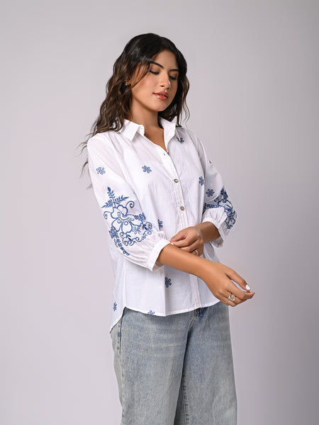 Elegant White Button-Down Shirt with Blue Floral Detailing
