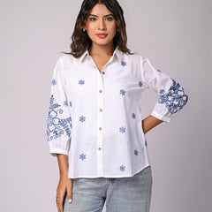 Elegant White Button-Down Shirt with Blue Floral Detailing