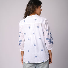 Elegant White Button-Down Shirt with Blue Floral Detailing