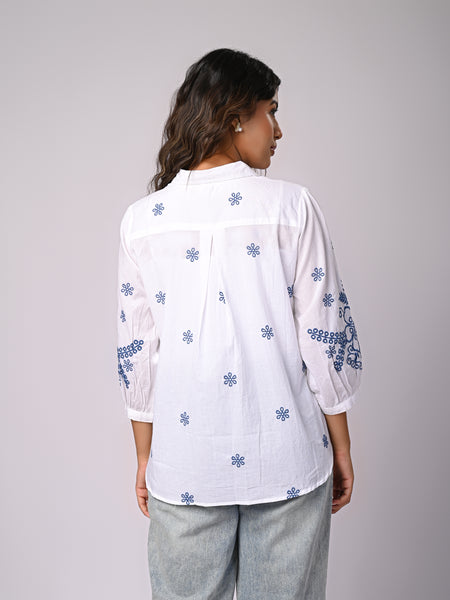 Elegant White Button-Down Shirt with Blue Floral Detailing