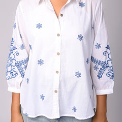 Elegant White Button-Down Shirt with Blue Floral Detailing