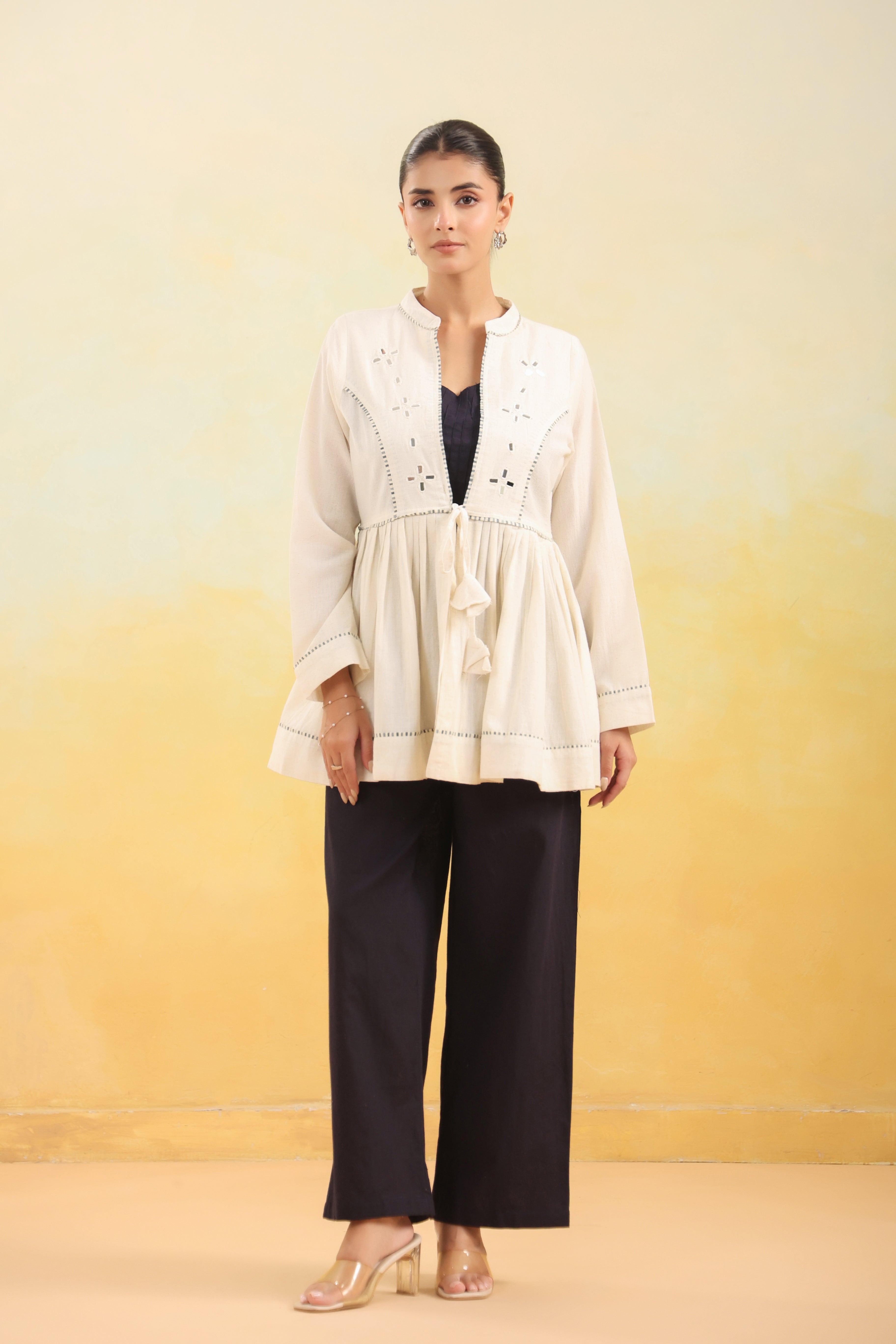Women Off White Embroidered Peplum Top with Black Straight Pants Set