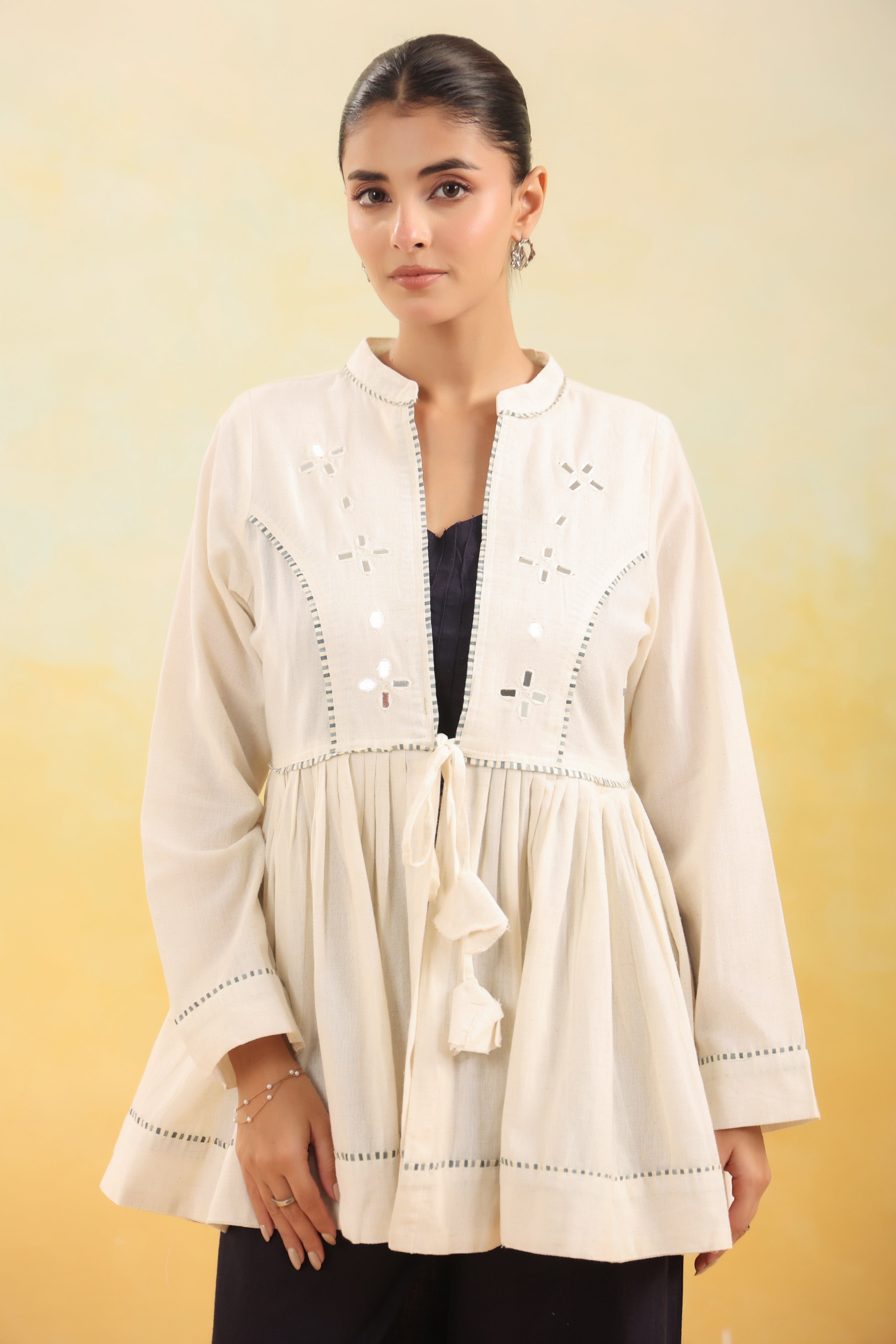 Women Off White Embroidered Peplum Top with Black Straight Pants Set