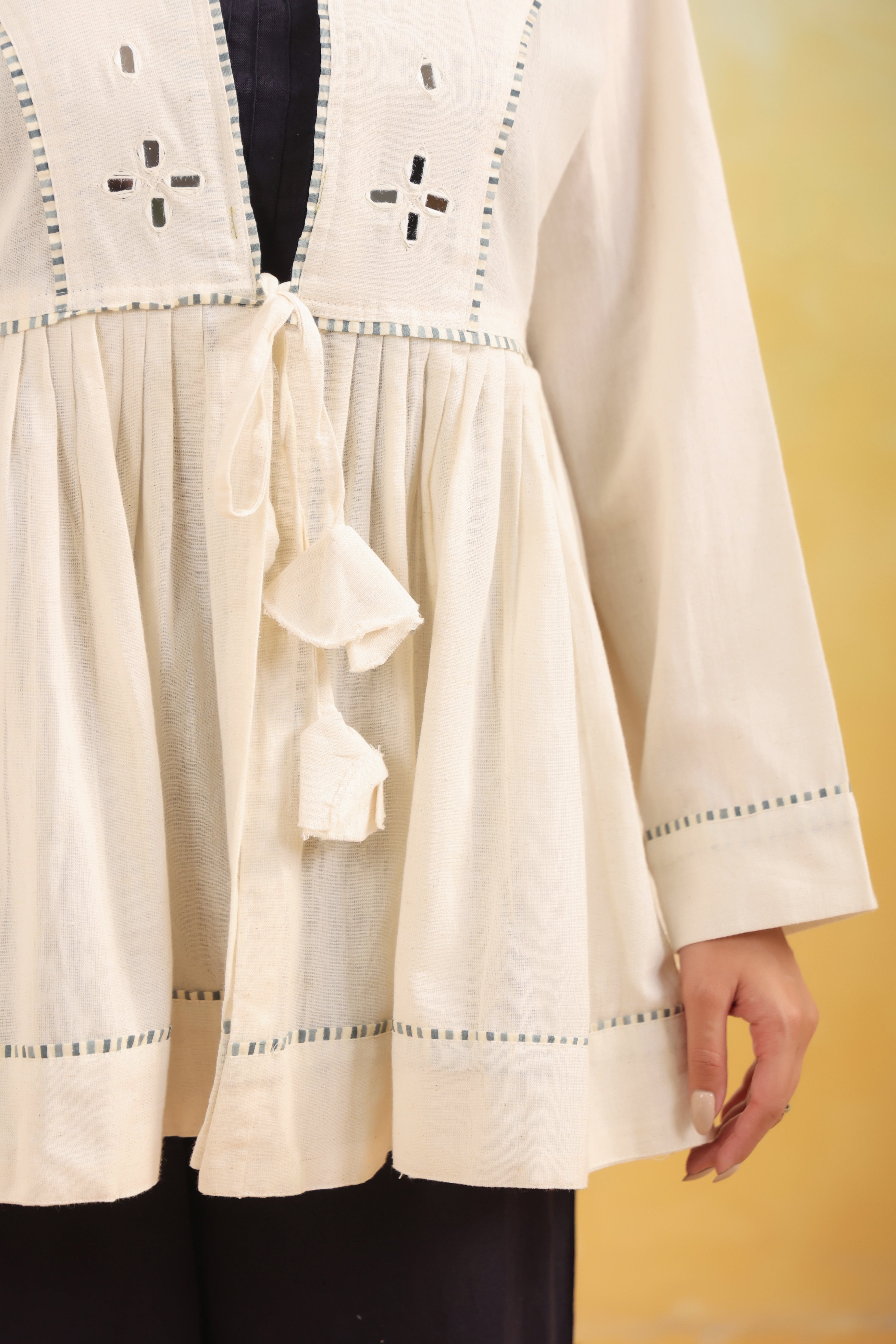 Women Off White Embroidered Peplum Top with Black Straight Pants Set