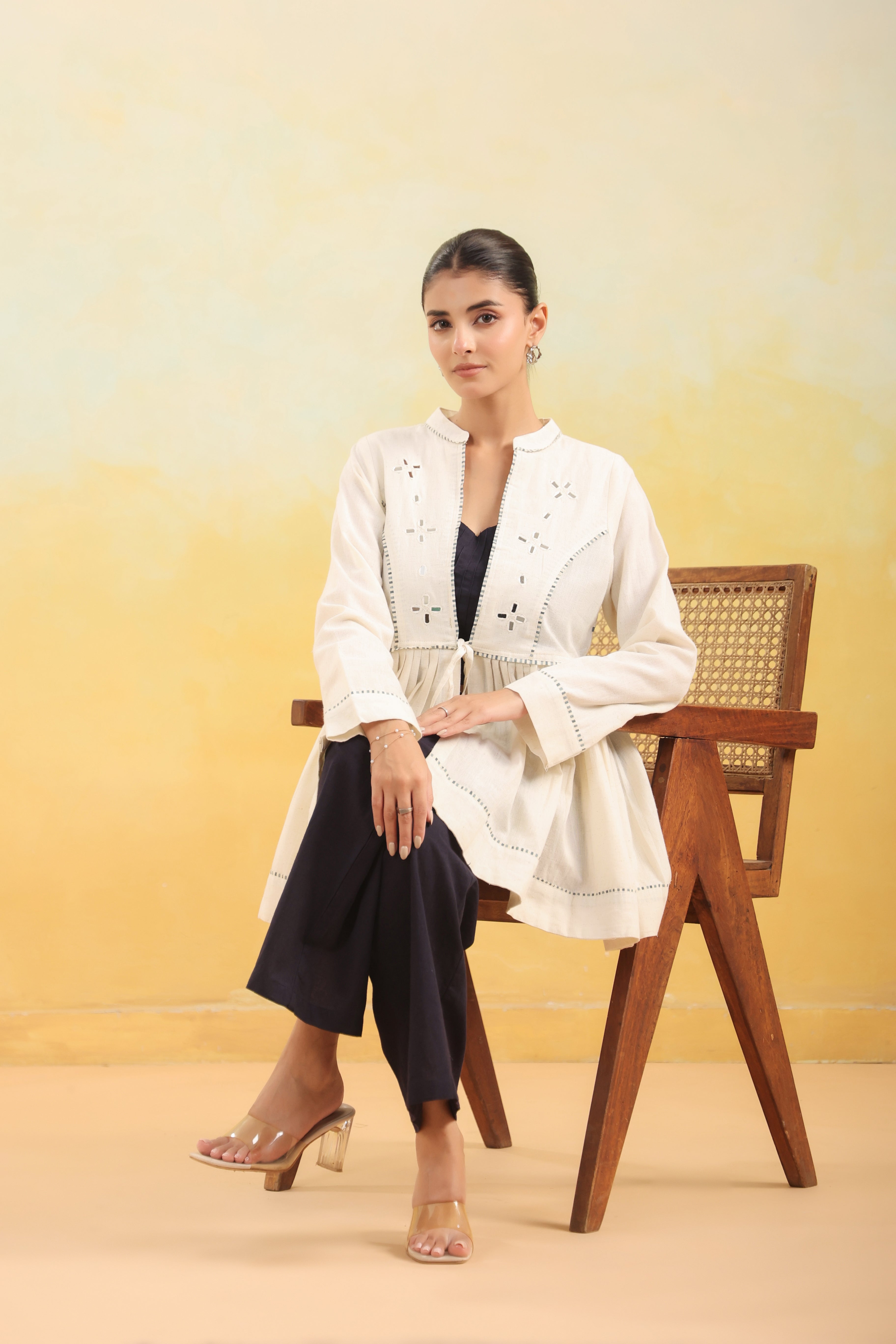 Women Off White Embroidered Peplum Top with Black Straight Pants Set