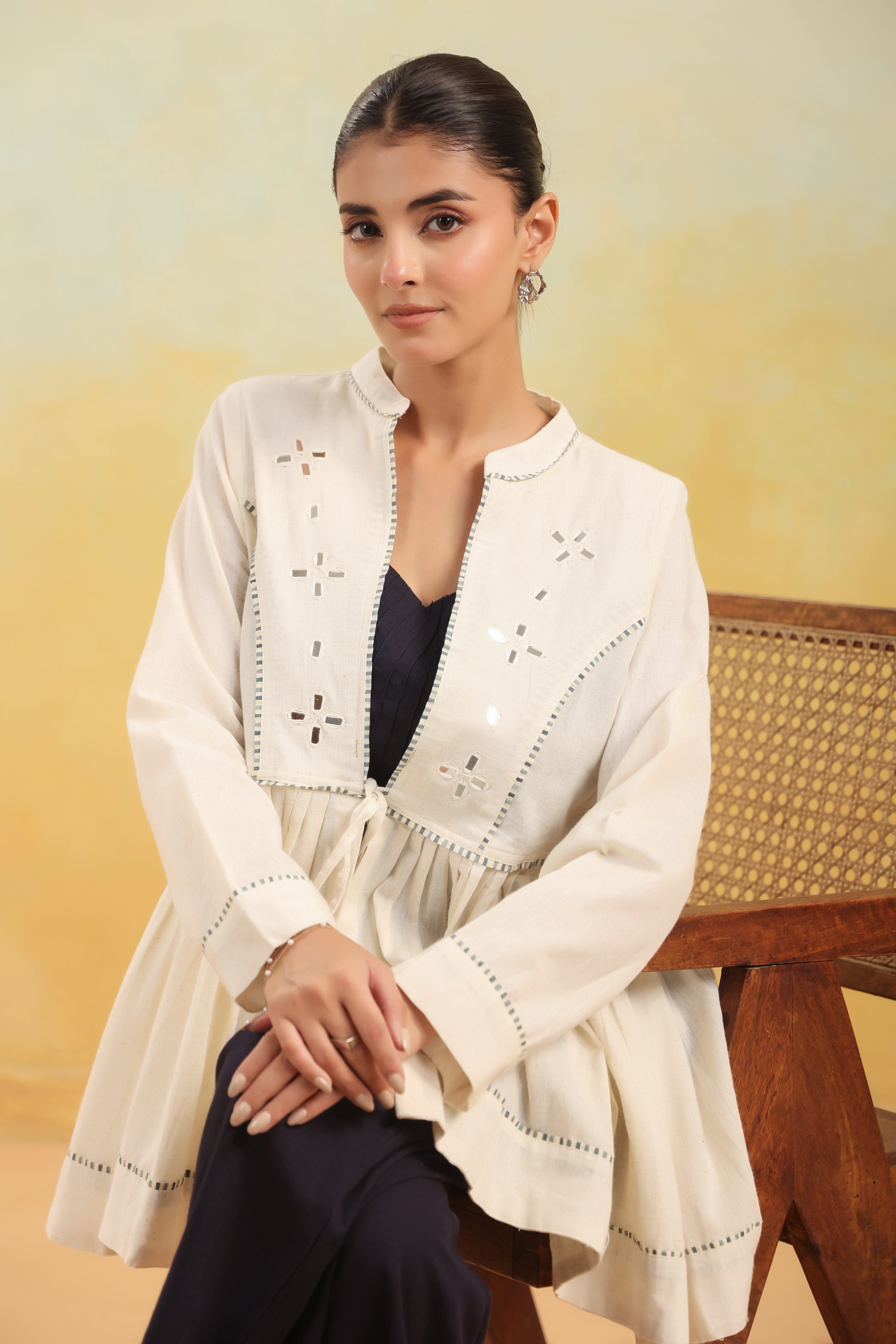 Women Off White Embroidered Peplum Top with Black Straight Pants Set