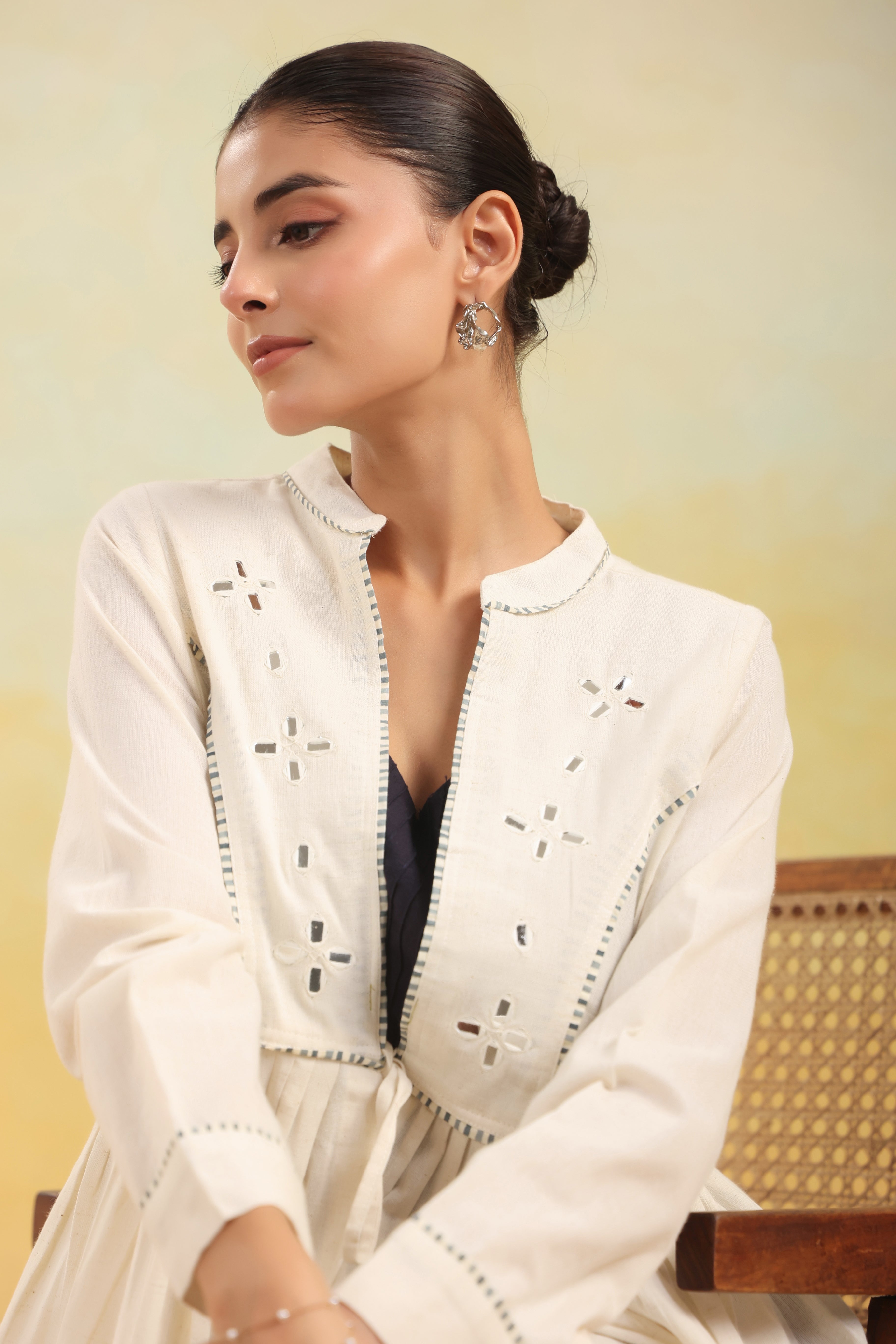 Women Off White Embroidered Peplum Top with Black Straight Pants Set